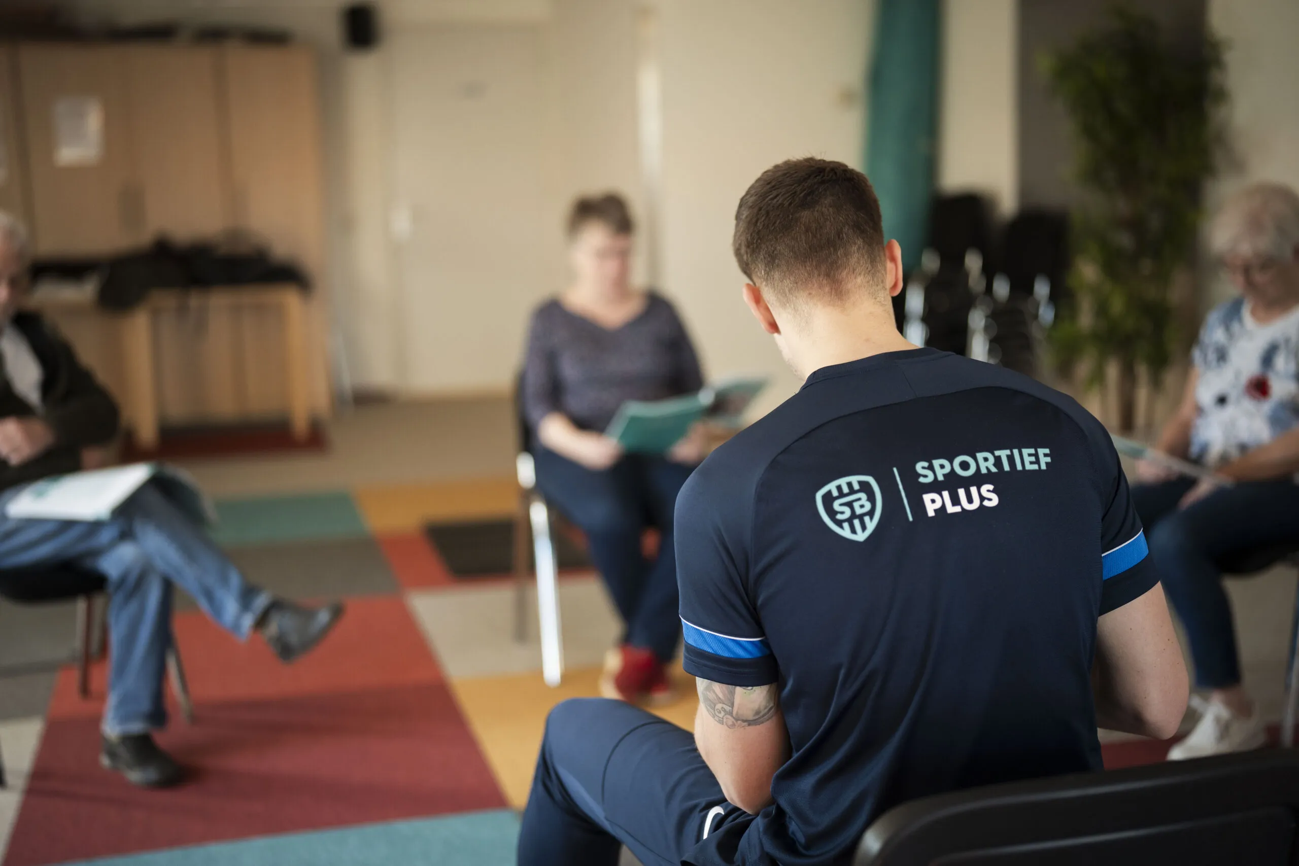 Trainer die een les geeft